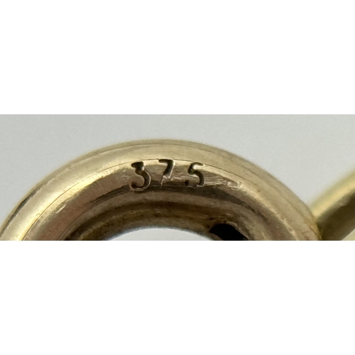 825 - A 9K Yellow Gold Diamond Pendant on a 9K Yellow Gold Chain. 1cm and 40cm. 2.5g. NL-27/61505.