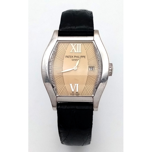 195 - A Patek Philippe 18K White Gold and Diamond Gondolo Ladies Watch. Model 4949. New strap with origina... 