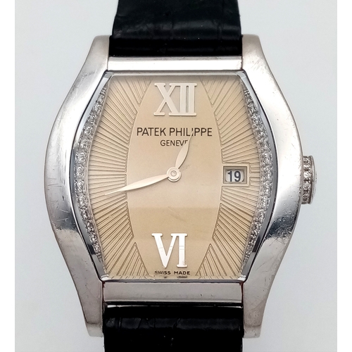 195 - A Patek Philippe 18K White Gold and Diamond Gondolo Ladies Watch. Model 4949. New strap with origina... 