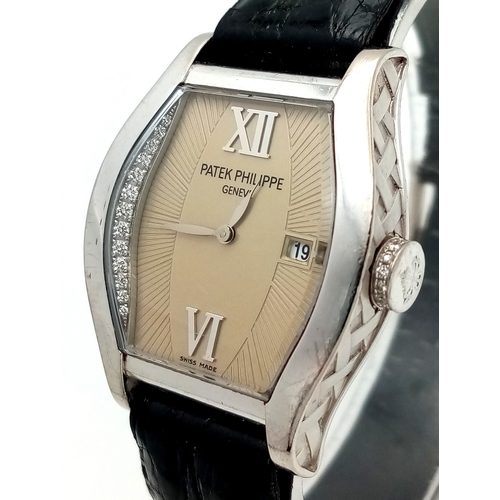 195 - A Patek Philippe 18K White Gold and Diamond Gondolo Ladies Watch. Model 4949. New strap with origina... 