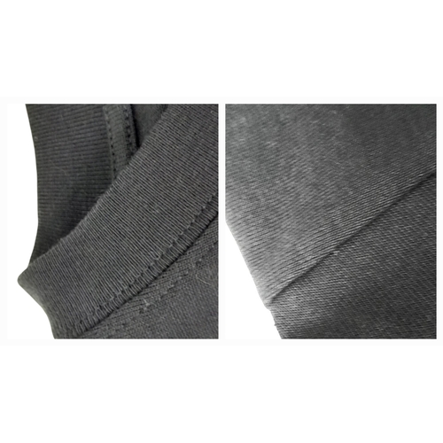 808 - A black Gucci oversized t-shirt with the iconic rock logo, size XS, width measures 54cm.  Very good ... 