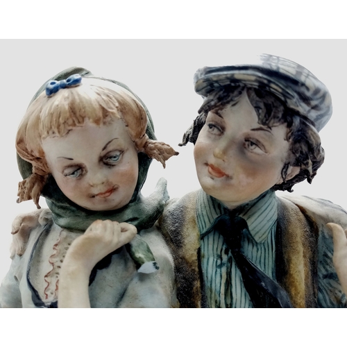 821 - A Wonderful Vintage Capodimonte Ceramic Piece Featuring a Courting Boy and Girl. Note: Small breakag... 