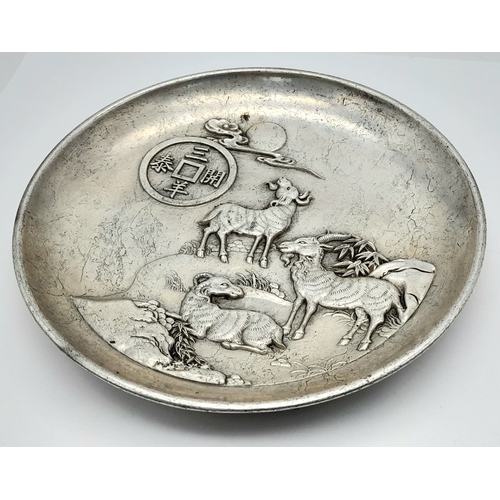 828 - A SUPERB VINTAGE/ANTIQUE CHINESE  WHITE METAL DISH DEPICTING  GOATS TO THE FRONT AND DRAGONS ON THE ... 