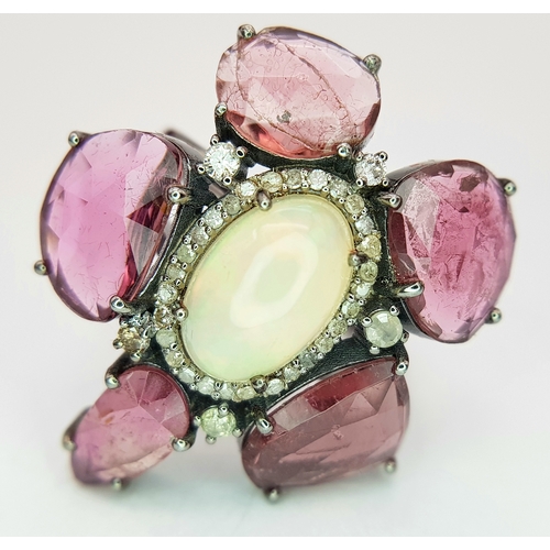 125 - A 5.65ct Pink Tourmaline Gemstone Ring with Opal Centre Cabochon and 0.30ctw of Old Diamond Accents.... 