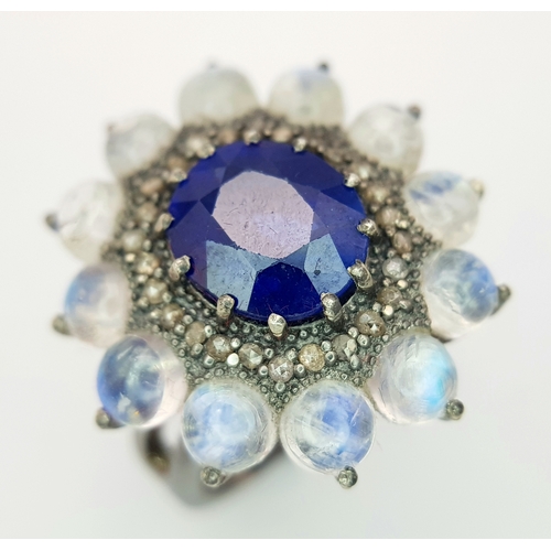 132 - A 2.6ct Blue Sapphire Ring with 3.2ct Moonstone and 0.20ctw of Old Cut Diamond Accents. Set in 925 S... 