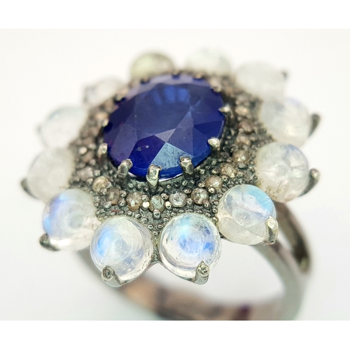 132 - A 2.6ct Blue Sapphire Ring with 3.2ct Moonstone and 0.20ctw of Old Cut Diamond Accents. Set in 925 S... 