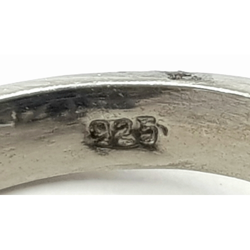 132 - A 2.6ct Blue Sapphire Ring with 3.2ct Moonstone and 0.20ctw of Old Cut Diamond Accents. Set in 925 S... 