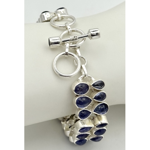 139 - A Gorgeous Double Row Tanzanite Gemstone Bracelet. Round and pear-shaped cuts. Set in 925 Silver. 38... 