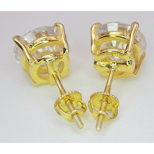 237 - A Pair of 6ctw White Moissanite Stud Earrings. Set in gilded 925 Silver. Comes with a case. CD-1979