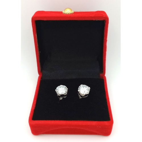 802 - A Pair of 5ctw White Moissanite Stud Earrings. Set in 925 gilded Silver. Comes with a case. CD-1980.
