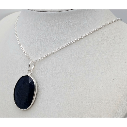 809 - A Blue Sapphire Pendant with a 925 Silver with Chain. 3.5cm and 42cm. CD-1923