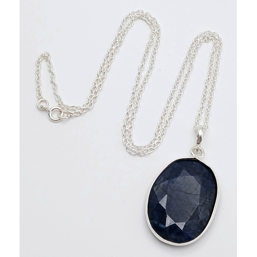 809 - A Blue Sapphire Pendant with a 925 Silver with Chain. 3.5cm and 42cm. CD-1923
