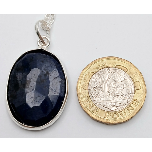 809 - A Blue Sapphire Pendant with a 925 Silver with Chain. 3.5cm and 42cm. CD-1923