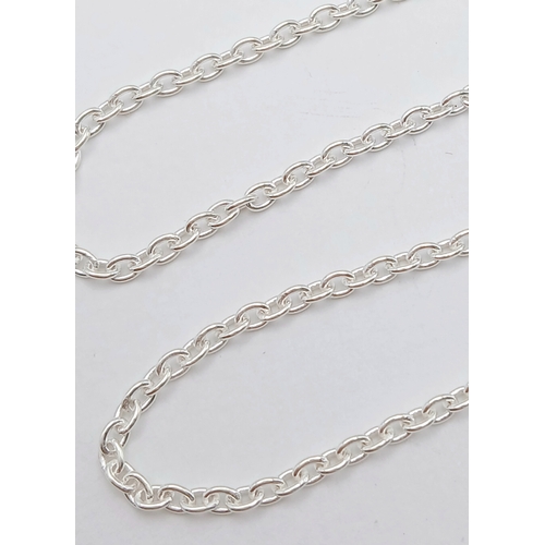 809 - A Blue Sapphire Pendant with a 925 Silver with Chain. 3.5cm and 42cm. CD-1923