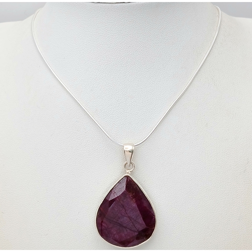 827 - A Ruby Gemstone Pear-Shaped Pendant with a 925 Silver Chain. 4cm and 42cm. Ruby - 50ct. CD-1974.