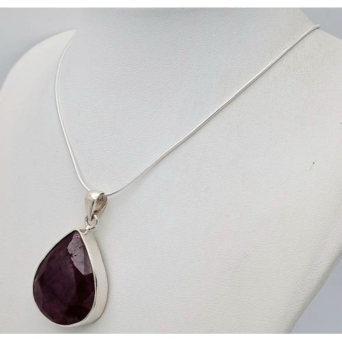 827 - A Ruby Gemstone Pear-Shaped Pendant with a 925 Silver Chain. 4cm and 42cm. Ruby - 50ct. CD-1974.