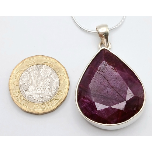 827 - A Ruby Gemstone Pear-Shaped Pendant with a 925 Silver Chain. 4cm and 42cm. Ruby - 50ct. CD-1974.