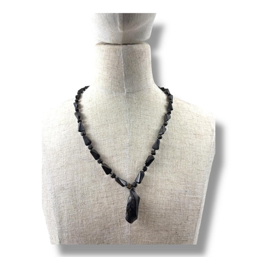 1019 - A natural hand carved Agarwood Bead Necklace with Pendant. 
The natural agarwood fragrance is well k... 
