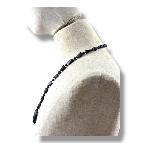 1019 - A natural hand carved Agarwood Bead Necklace with Pendant. 
The natural agarwood fragrance is well k... 