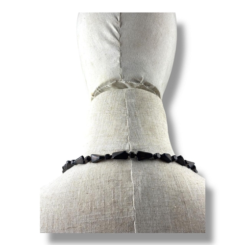 1019 - A natural hand carved Agarwood Bead Necklace with Pendant. 
The natural agarwood fragrance is well k... 