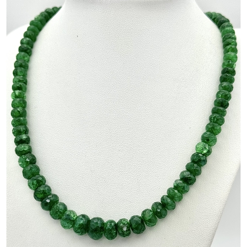 216 - A 200ct Graduating Emerald Rondelle Gemstone Necklace with a Ruby and 925 Silver Clasp. 42cm. CD-196... 