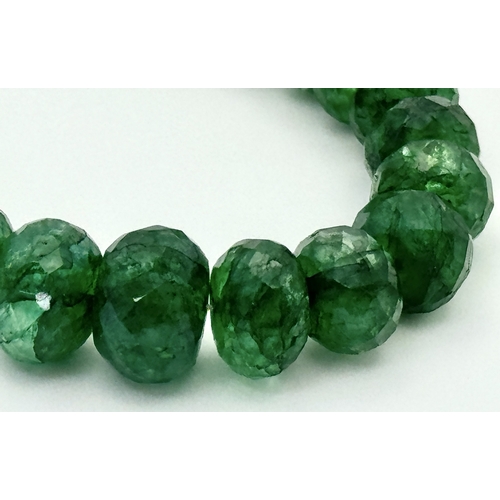216 - A 200ct Graduating Emerald Rondelle Gemstone Necklace with a Ruby and 925 Silver Clasp. 42cm. CD-196... 