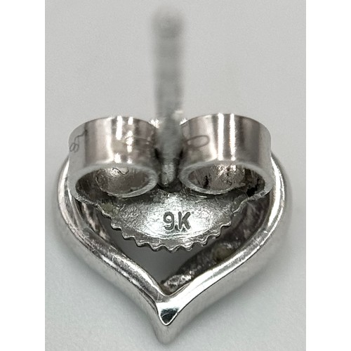 647 - A Pair of 9K White Gold Heart-Shaped Diamond Stud Earrings. 1.23g.
