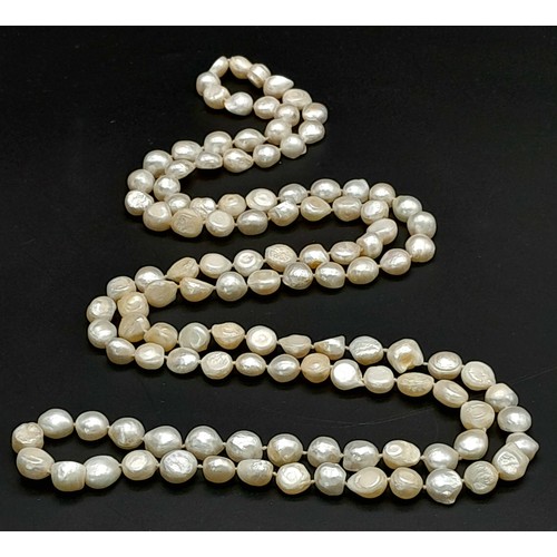 836 - A matinee length single strand of Freshwater Pearl beaded necklace. Total length 132cm.