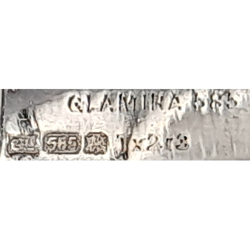 135 - A 14K White Gold Diamond Bracelet. 3.5ctw of round brilliant cut diamonds in a Tetrus-esque design. ... 