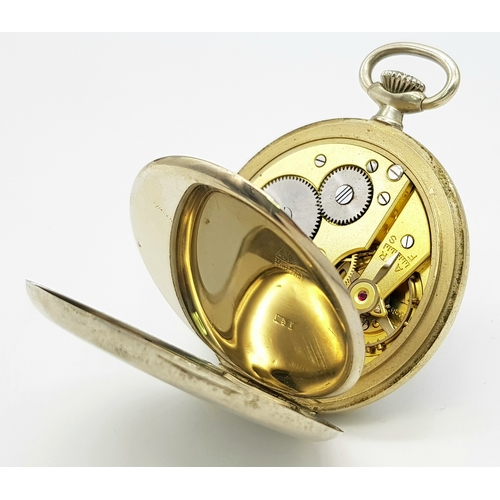 143 - A Vintage Omega White Metal Pocket Watch. 48mm diameter. White dial with second sub dial. Top winder... 