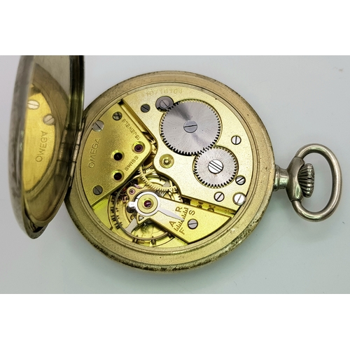 143 - A Vintage Omega White Metal Pocket Watch. 48mm diameter. White dial with second sub dial. Top winder... 