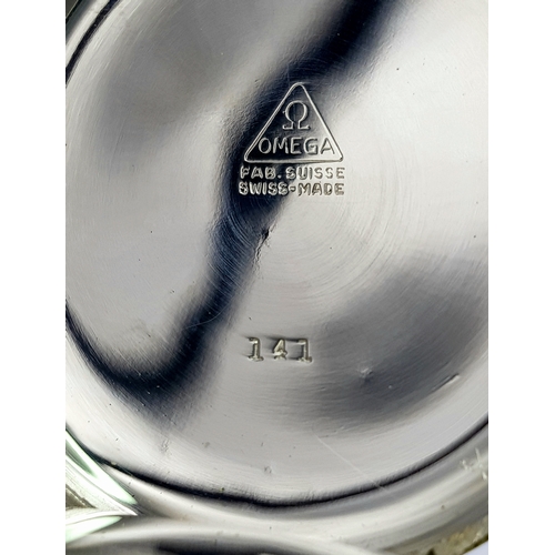 143 - A Vintage Omega White Metal Pocket Watch. 48mm diameter. White dial with second sub dial. Top winder... 