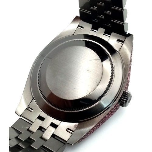 39 - A Rolex 'Vampire' Datejust Gents Automatic Watch. Model 126300. The entire exterior of the watch (in... 