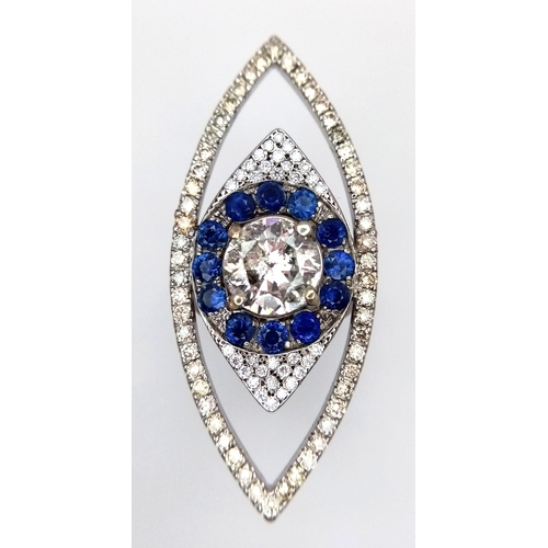 99 - An Art Deco Style Diamond and Sapphire Ring set in 18K White Gold. A 1.5ct round brilliant cut centr... 