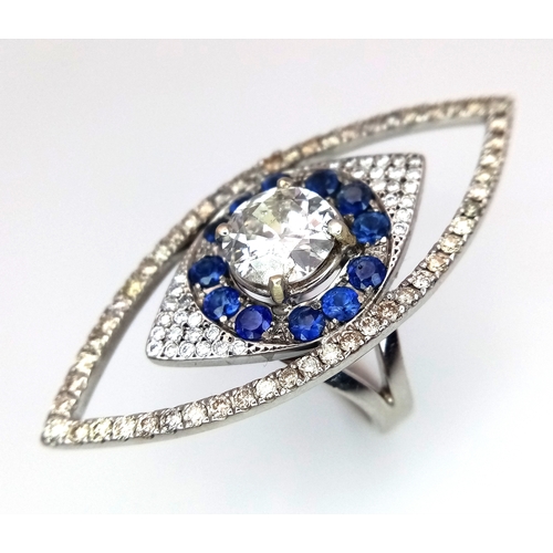 99 - An Art Deco Style Diamond and Sapphire Ring set in 18K White Gold. A 1.5ct round brilliant cut centr... 