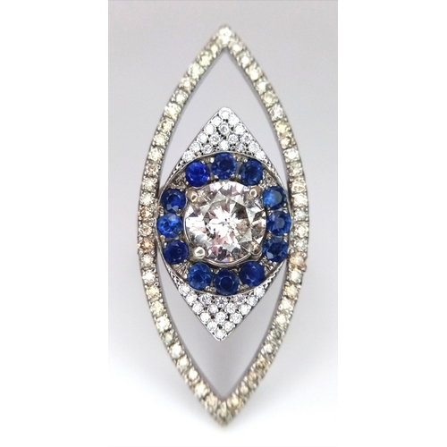 99 - An Art Deco Style Diamond and Sapphire Ring set in 18K White Gold. A 1.5ct round brilliant cut centr... 