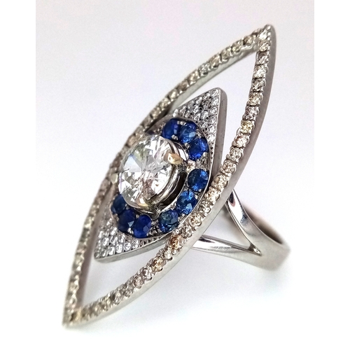 99 - An Art Deco Style Diamond and Sapphire Ring set in 18K White Gold. A 1.5ct round brilliant cut centr... 