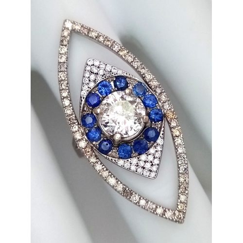 99 - An Art Deco Style Diamond and Sapphire Ring set in 18K White Gold. A 1.5ct round brilliant cut centr... 