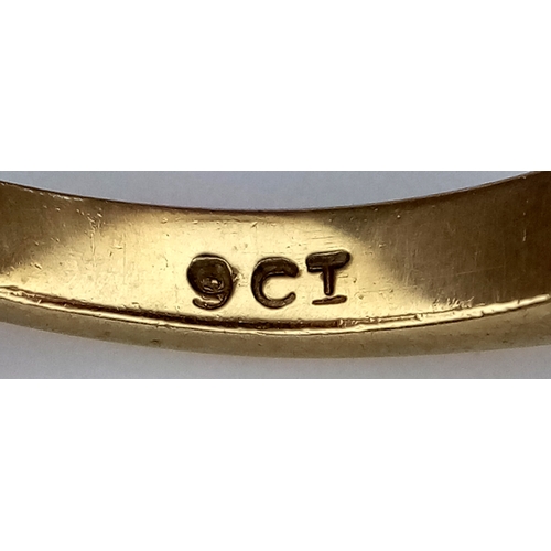 106 - A 9K Yellow Gold, Garnet Half Eternity Ring. Size N 1/2. 2.25g.