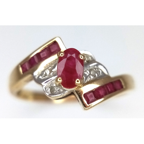 109 - A 9K Yellow Gold, Ruby and Diamond Crossover Ring. Size N 1/2. 2.13g.