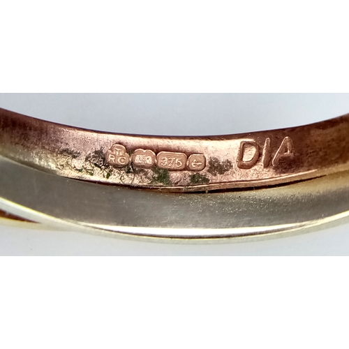 137 - A 9K Rose and White Gold Diamond Crossover Ring. Size N 1/2. 3.2g.