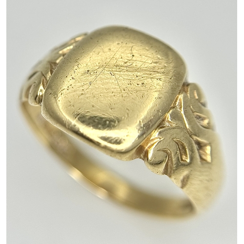 64 - A Vintage 9K Yellow Gold Signet Ring. Size V 1/2. 6.6g.