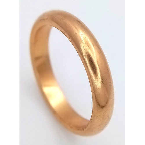 67 - An 18K Yellow Gold Band Ring. 4mm width. Size M. 5g.