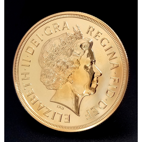 101 - A Royal Mint 2002 United Kingdom Brilliant Uncirculated Five-Pound Coin. The obverse of the coin is ... 