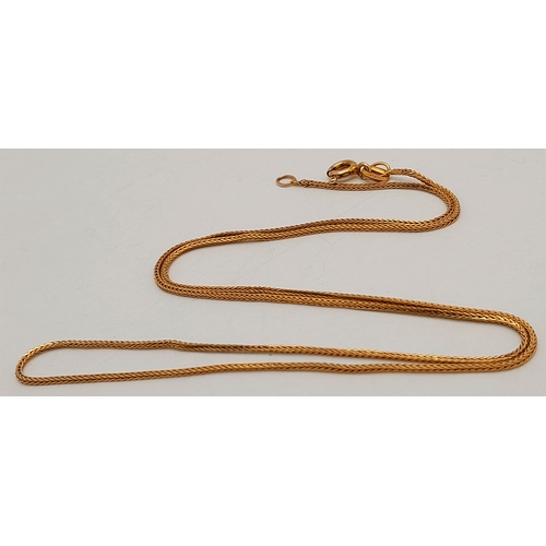 102 - A 9K Yellow Gold Disappearing Necklace. 40cm. 1.53g.