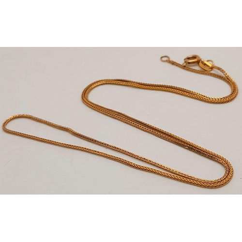 102 - A 9K Yellow Gold Disappearing Necklace. 40cm. 1.53g.