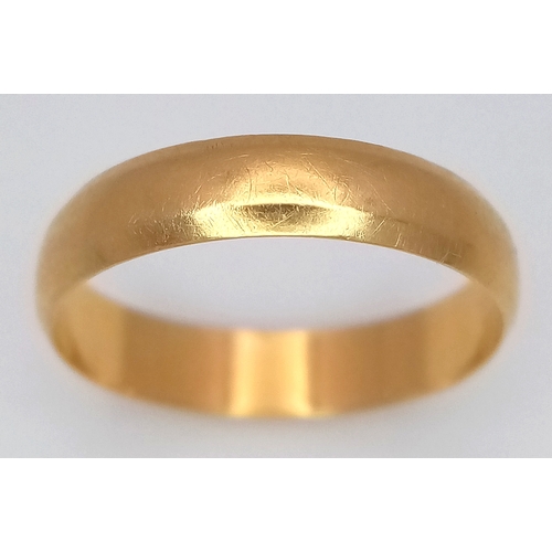 116 - An 18K Yellow Gold Band Ring. 4mm width. Size K 1/2. 2g.