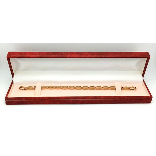 150 - A 9K Yellow Gold Bar Link Bracelet. 18cm. 9.8g.