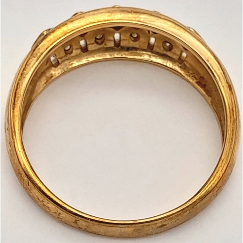 74 - A 9K Yellow Gold Ruby and Diamond Ring. Size P. 3.4g.