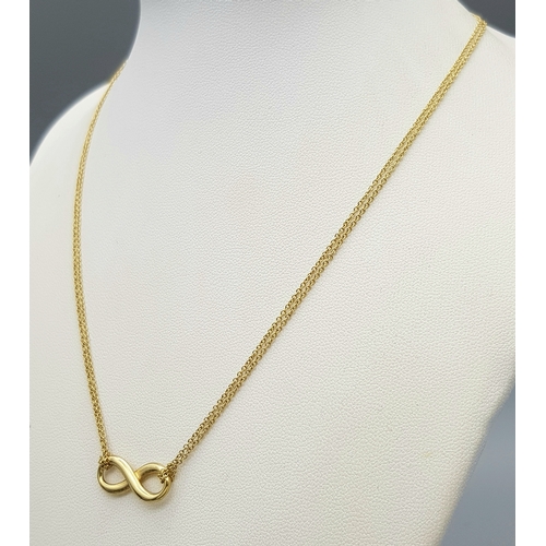 110 - A Tiffany and Co 18k yellow gold infinity necklace, 4.5g total weight, 16” chain length in original ... 
